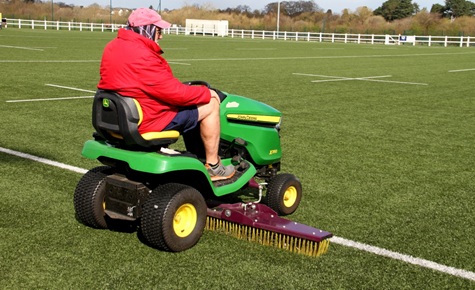 groundsman volunteer brush artifical pitch sml